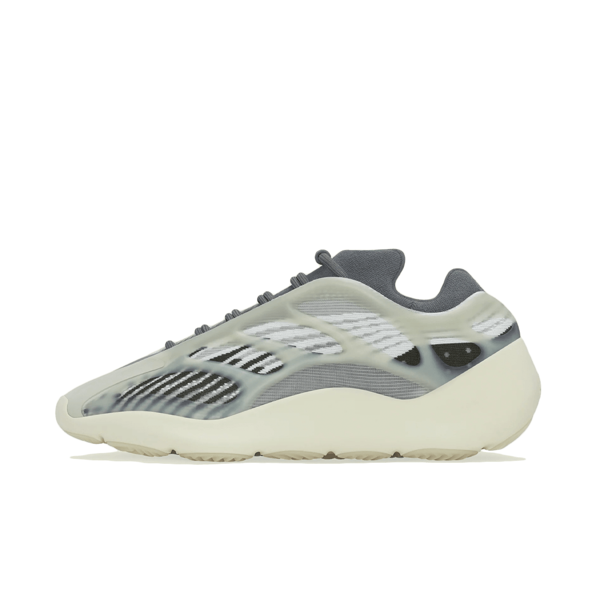 Zijaanzicht van de Adidas Yeezy 700 V3 Fade Salt met glow-in-the-dark cage, mesh upper en crèmekleurige zool tegen witte achtergrond