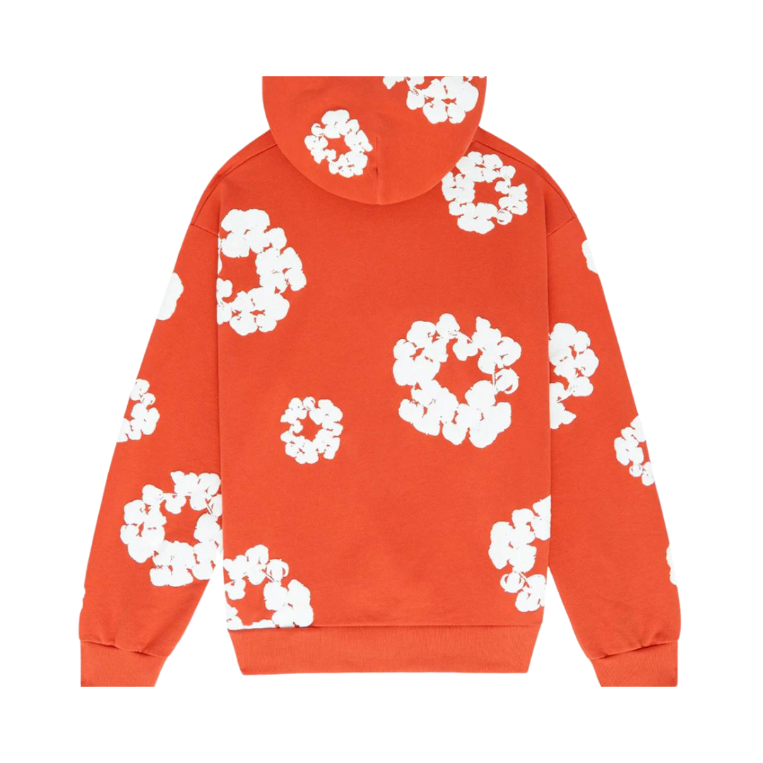 Denim Tears The Cotton Wreath Hoodie Orange – close-up borduursel detail op zachte oranje stof