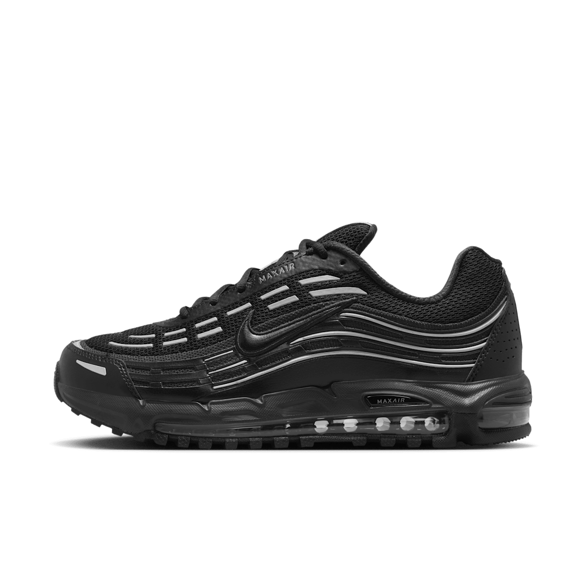 Zijaanzicht van de Nike Air Max TL 2.5 in zwart met metallic silver details, zichtbare Air-unit in de zool en reflectieve upper tegen witte achtergrond