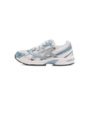 ASICS GEL-1130 Shark Tank 1201A256-116 zijaanzicht met mesh in grijstinten, reflecterende zilveren overlays en technische loopzool

