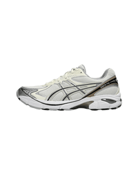 ASICS GT-2160 Cream Greige 1203A320-111 zijaanzicht met cream mesh, greige overlays en metallic accenten in retro running design

