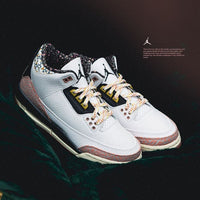 Air Jordan 3 Retro Vintage Floral FZ3620-100 on-feet gecombineerd met lichtblauwe jeans voor een frisse voorjaarslook

