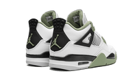 Air Jordan 4 Seafoam bovenaanzicht op neutrale ondergrond met zichtbare details van leer, mesh en groene accenten