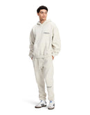 Fear-Of-God-Essentials-Hoodie-Fw22-Light-Oatmeal_Model_Fit_Snrkickz