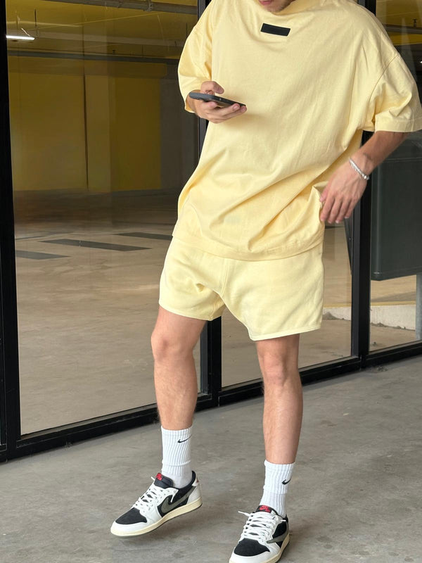 Fear of God Essentials Garten Gelbes Kurzes Set FW23
