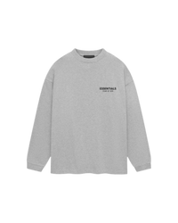 Studio opname van de Fear of God Essentials Jersey Long Sleeve T-Shirt Light Heather Gray met ronde hals en zwart Essentials logo op de borst