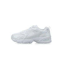 New Balance 530 Triple White zijaanzicht met volledig witte mesh upper, leren overlays en ABZORB-demping

