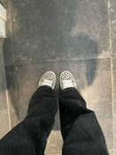 adidas Campus 00s WMNS Leopard – detail van tonglabel en hielbadge met adidas Trefoil en subtiele leopard-branding 