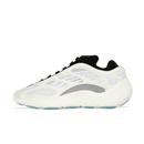 Zijaanzicht van de Adidas Yeezy 700 V3 Azael met glow-in-the-dark cage, crèmekleurige zool en witte mesh basis tegen witte achtergrond