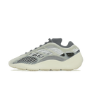 Zijaanzicht van de Adidas Yeezy 700 V3 Fade Salt met glow-in-the-dark cage, mesh upper en crèmekleurige zool tegen witte achtergrond