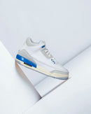Air Jordan 3 Retro Lucky Shorts on-feet gecombineerd met loose fit jeans voor een frisse retro look

