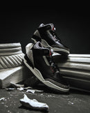 Close-up van Air Jordan 3 Retro Off Noir CT8532-001 met zichtbare Air unit, elephant print en Off Noir nubuck afwerking

