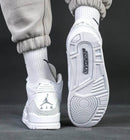 Air Jordan 3 Pure Money – achterzijde met metallic Jumpman heel tab en witte midsole/outsole combinatie