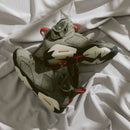 Close-up van Air Jordan 6 Travis Scott Medium Olive CN1084-200 met perforaties, zichtbare Air unit en Cactus Jack branding

