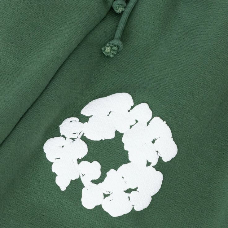 Denim Tears The Cotton Wreath Shorts Green – authentieke label close-up met originele branding