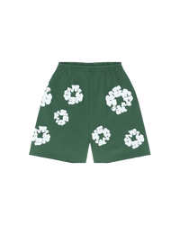 Denim Tears The Cotton Wreath Shorts Green – oversized shorts in lichtgroene tint met rood-wit borduursel