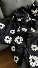 Denim Tears The Cotton Wreath Sweatpants Black – authentiek label en tag detail
