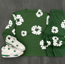 Denim Tears Long Sleeve Cotton Wreath T-shirt Green – close-up borduursel detail op zachte groene katoen