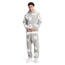 Denim Tears The Cotton Wreath Sweatpants Grey – close-up borduursel detail op zachte grijze joggingstof