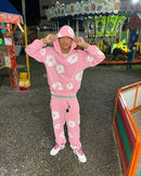 Denim Tears The Cotton Wreath Sweatpants Pink – close-up borduursel detail op zachte roze joggingstof