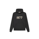 Fear of God Essentials 1977 Hoodie Iron – voorkant met oversized pasvorm, grijze kleur en iconisch 1977-logo op de borst via Snrkickz