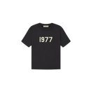 Fear of God Essentials 1977 Iron T-shirt front view highlighting signature 1977 logo and soft cotton structure.
