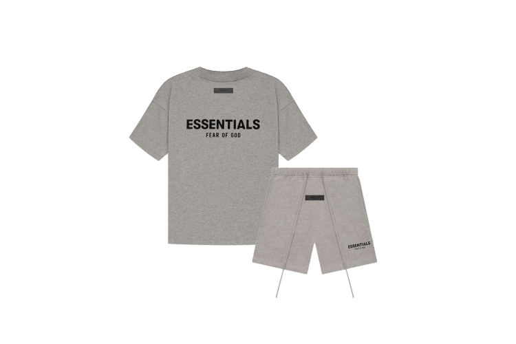 Fear of God Essentials Dark Oatmeal Summer Set with T-shirt and shorts displayed flat on neutral beige background.