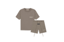 Fear of God Essentials Desert Taupe Summer Set with short sleeve T-shirt and shorts displayed flat on clean studio background.