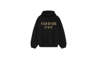 Fear of God Essentials FW24 Black Yellow State Hoodie flat lay showing black cotton fabric, bold yellow logo print and relaxed streetwear fit.