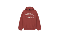 Fear of God Essentials FW24 Crimson Hoodie flat lay showing bold red tone, soft cotton fleece and subtle Essentials chest logo.