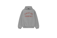 Fear of God Essentials FW24 Dark Heather Hoodie flat lay showing dark grey tone, soft fleece texture and subtle Essentials chest logo.