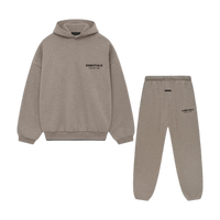 Fear of God Essentials FW24 Heather Taupe hoodie and sweatpants set flat lay highlighting matching tone, oversized fit and clean design.