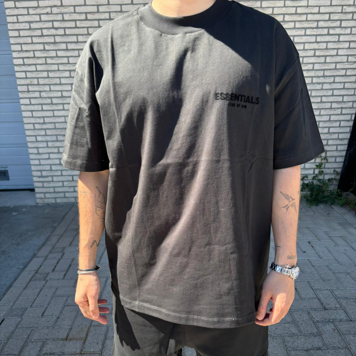 fear-of-god-essentials-limo-black-summer-setsnrkickz-model on body