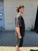 fear-of-god-essentials-limo-black-summer-setsnrkickz-model on body 2