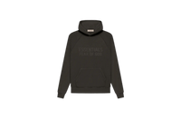 Fear of God Essentials Off Black Hoodie flat lay showing washed black tone, soft cotton fabric and subtle Essentials chest logo.
