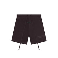 Fear of God Essentials Plum shorts flat lay highlighting minimal branding, elastic waistband and lightweight cotton texture.
