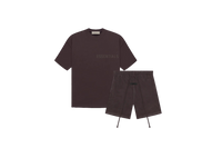 Fear of God Essentials Plum Summer Set with short sleeve T-shirt and shorts displayed flat on neutral studio background.