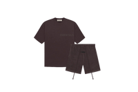 Fear of God Essentials Plum Summer Set with short sleeve T-shirt and shorts displayed flat on neutral studio background.