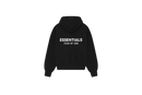 Fear of God Essentials SS25 Jet Black Hoodie flat lay showing deep black tone, soft cotton fleece and minimalist chest logo.