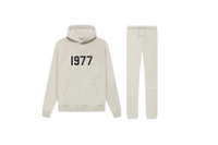 Fear of God Essentials Wheat 1977 full set with hoodie and sweatpants shown flat on clean light background.