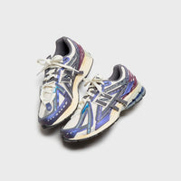 Onderzijde van de New Balance 1906A Inkwell met gripvaste zool in navy en off-white. De dempingstechnologie en structuur bieden performance-comfort in een subtiele kleurencombinatie.

