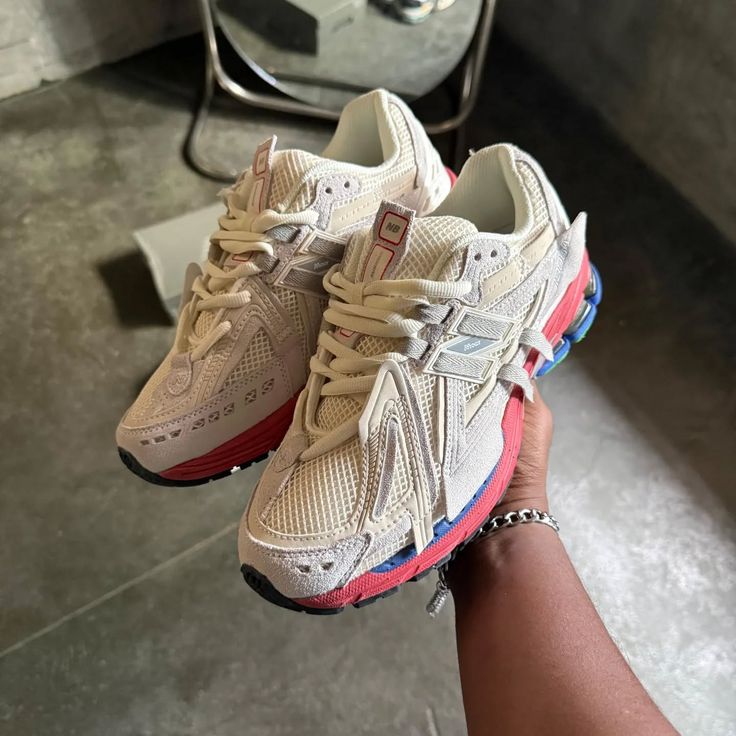 in-hand-new-balance-1906a-sea-salt-astro-dust on feet