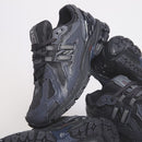 New Balance 1906D Eclipse met originele doos, extra veters en matte zwarte details van het Protection Pack


