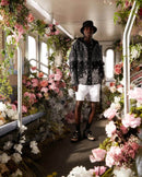 New Balance 1906R x Kith Black on-feet met zwarte sokken en urban streetwear fit