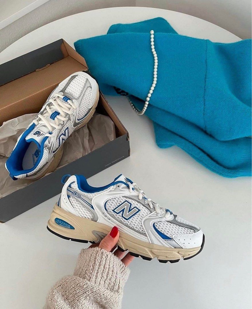 New Balance 530 White Blue Oasis met originele doos, zilveren details en retro running look

