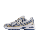 New Balance 740v2 Heron Blue Vintage Indigo – zijaanzicht met blauw suède, witte leren panels en klassieke basketbalvorm via Snrkickz