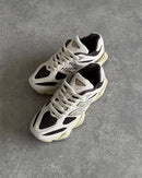 New Balance 9060 Sydney McLaughlin-Levrone Leinen Schwarz Kaffee