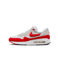 Zijaanzicht van de Air Max 1 ‘86 met oversized Air unit, witte mesh en felrode mudguard op neutrale achtergrond