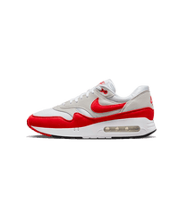Zijaanzicht van de Air Max 1 ‘86 met oversized Air unit, witte mesh en felrode mudguard op neutrale achtergrond