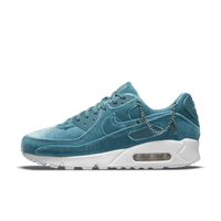 Zijaanzicht van de DO2194-001 met glanzend groene suede upper en witte zool, inclusief kettingdetail